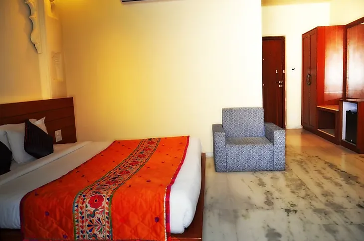 Superior room at Brij Bhoomi Resort, Nathdwara with cozy furnishings and soft lighting