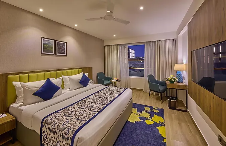 GRAND-CONTINENT-HEBBAL-premium-room-doublebed