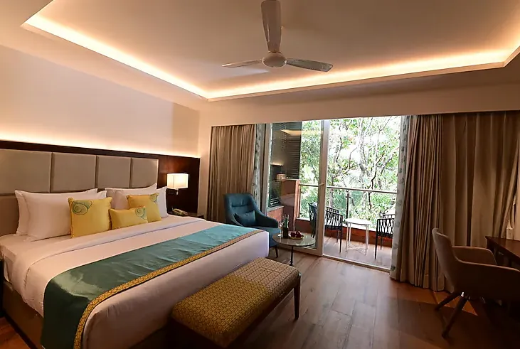Superior room interior with modern bed arrangement at Golden Tulip Vagator Goa
