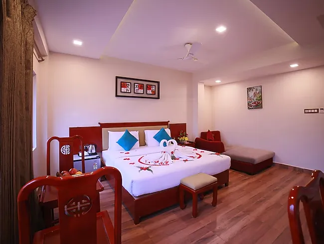 Suite room at Hotel President Madurai with separate living space and bedroom