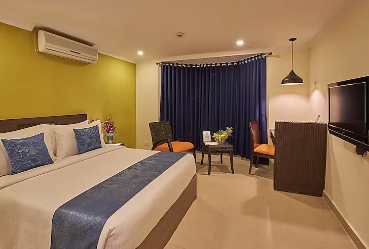 Tulip-Inn-Koramangala-deluxe-room-doublebed